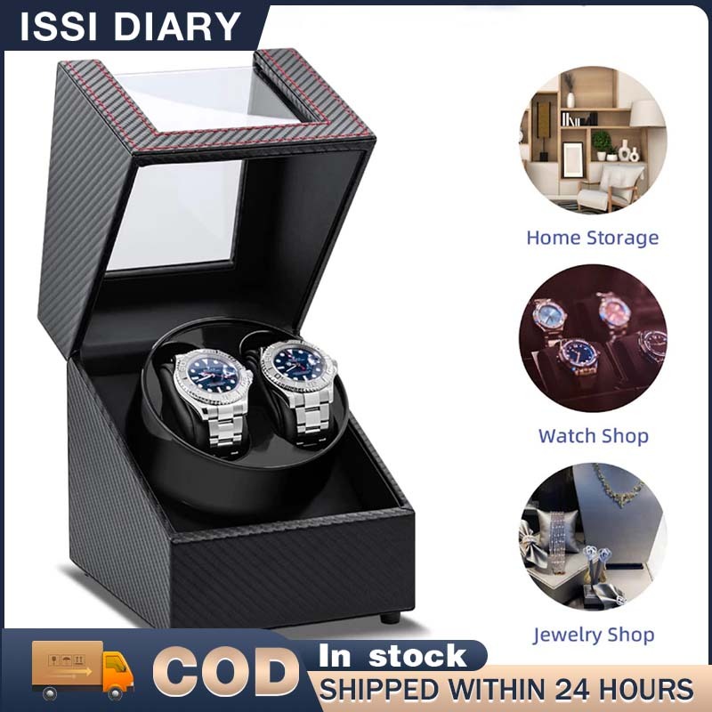 Dual automatic watch winder with carbon fiber finish holding two watches